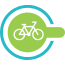 Fahrrad auf einem grünen Kreis umgeben von einem blauen Kreis